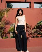 Pleated Wide-Leg Trousers — Black